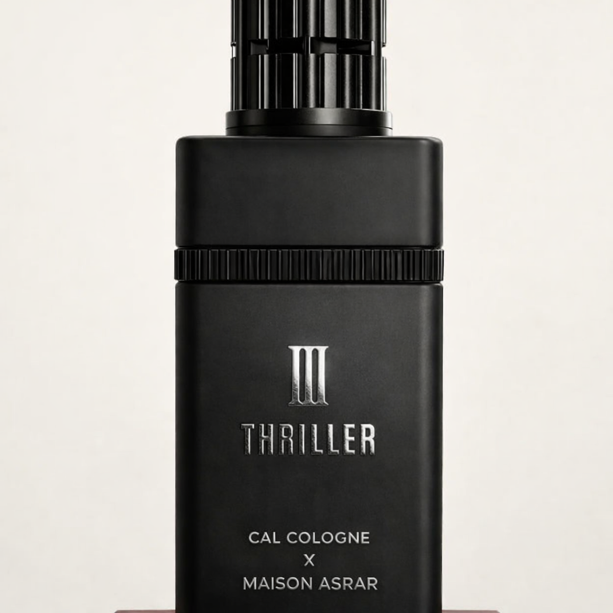 Maison Asrar Thriller Iii Extrait Parfum upright pedestal gallery showcase